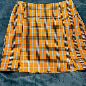 SHEIN skirt-

The color is -orange,blue,black